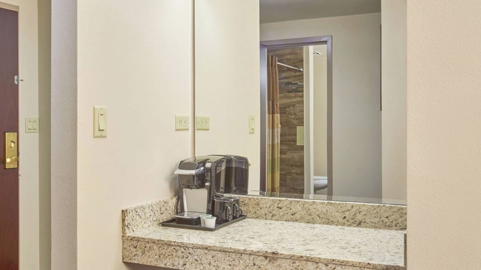 Start mornings right with in-room coffee and counter space.