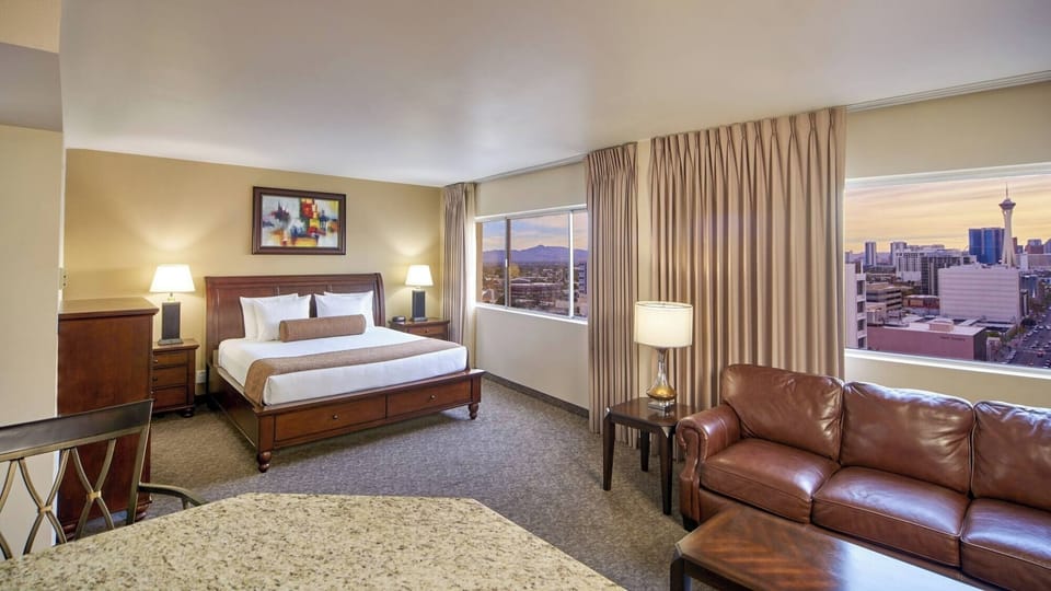Wake up to skyline views from a bright, airy suite.