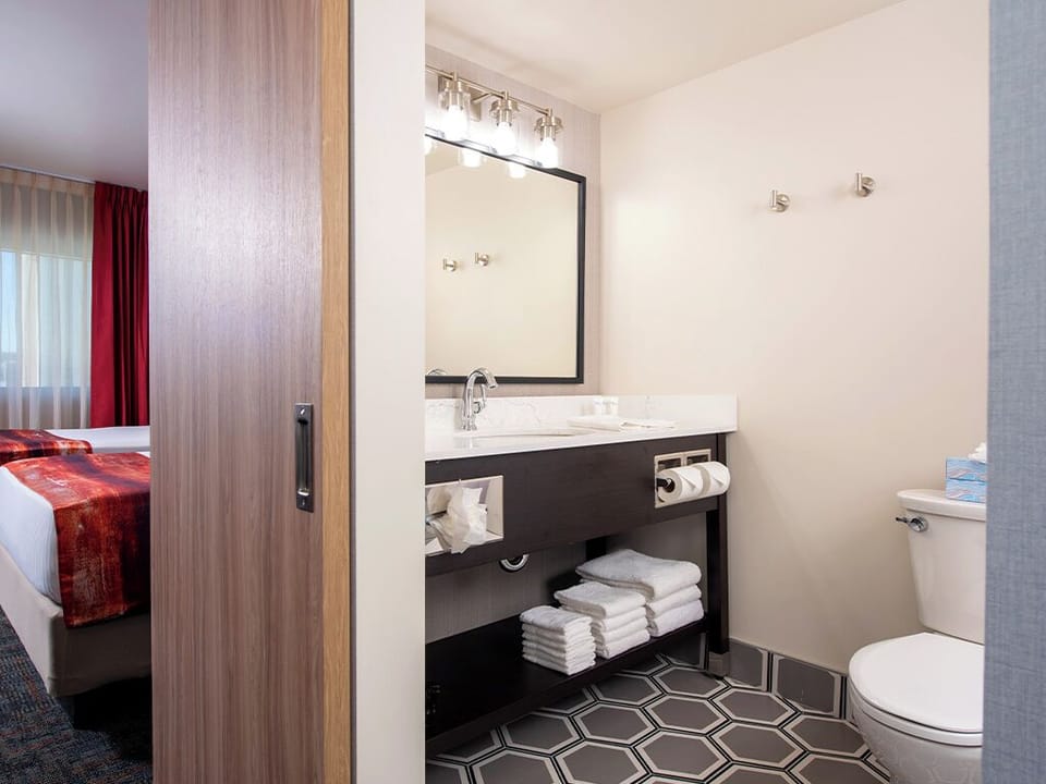 Enjoy extra counter space and neatly stocked towels for comfort.