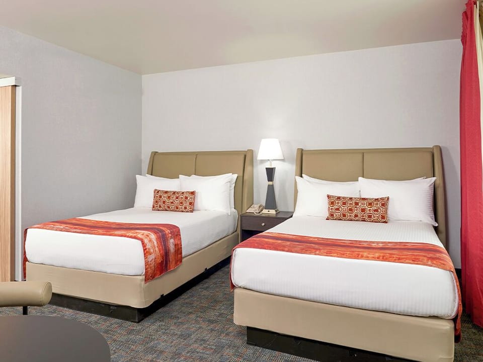 Stretch out on crisp linens for a restful night’s sleep.