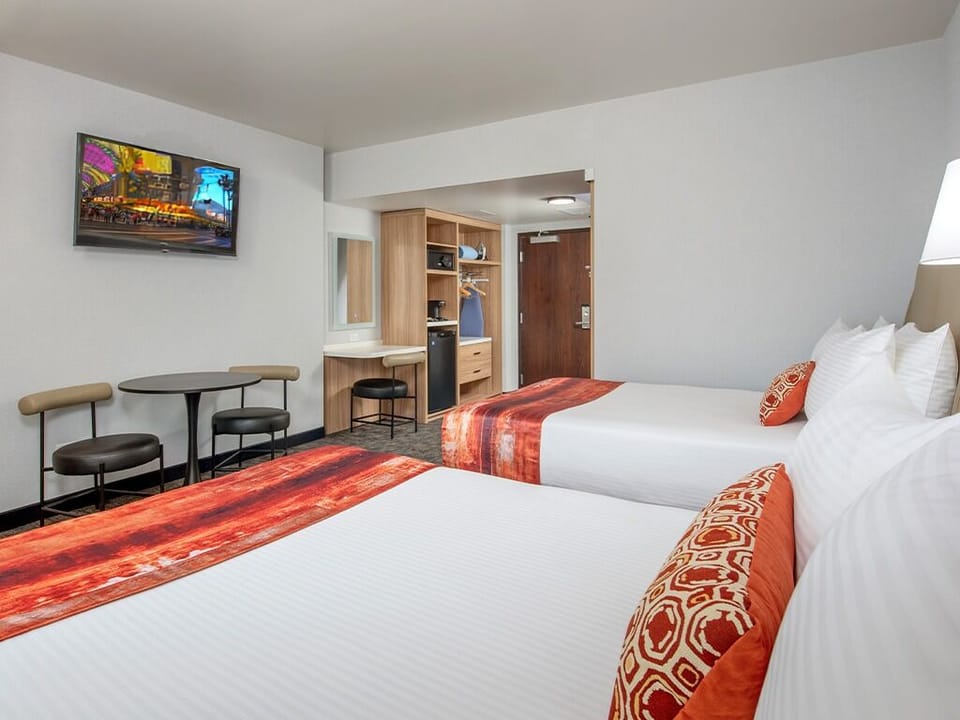 Settle in with in-room TV and cozy café-style seating.