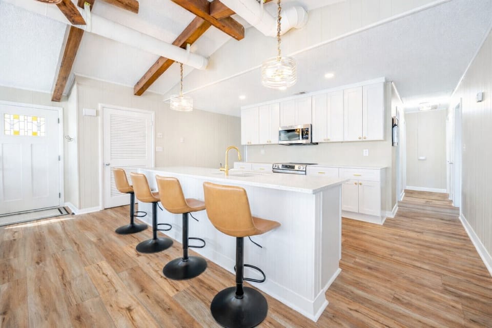 Fully updated kitchen with modern finishes and generous prep space—perfect for hosting and longer stays.