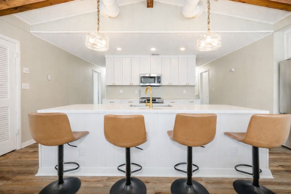 Spacious kitchen with oversized island and seating—great for casual meals and group gatherings.