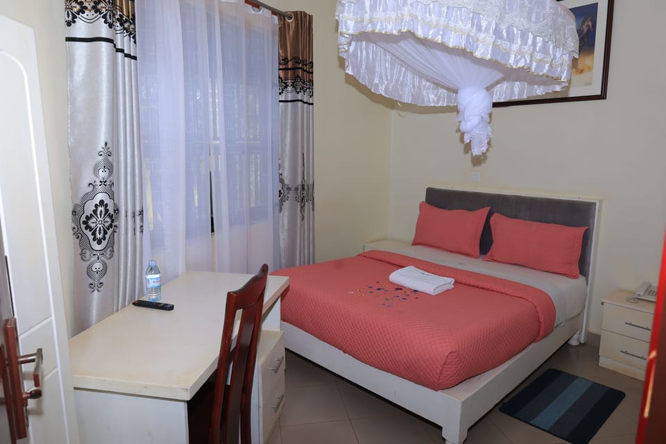 Luxury Double Room, Garden View | Blackout drapes, iron/ironing board, free WiFi