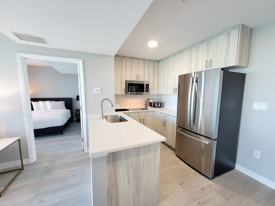 Deluxe Villa, Balcony, Harbor View | Living area | 55-inch flat-screen TV with cable channels