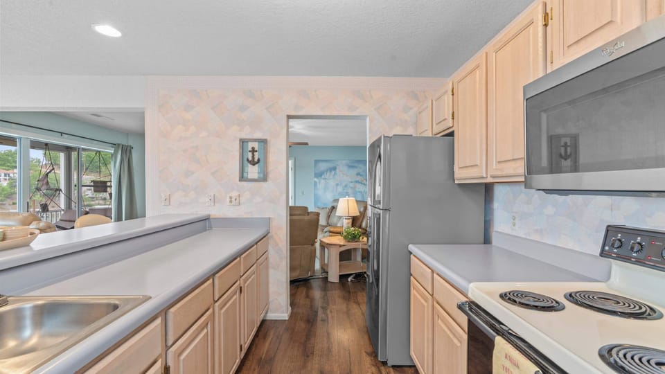 Condo, Multiple Beds, Balcony (By The Lake) | Private kitchen