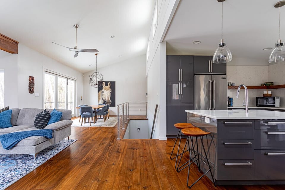 Step inside to soaring ceilings and a sun-drenched open space