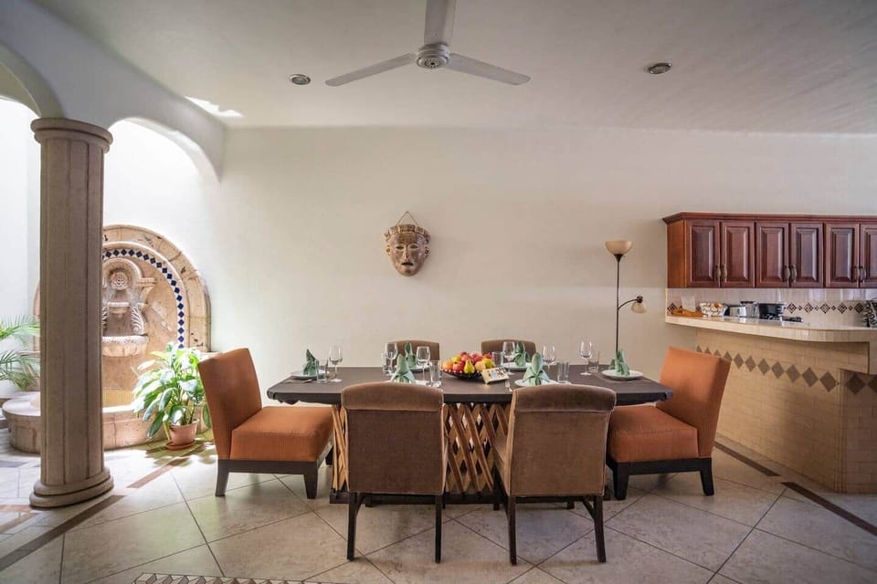 FIRST FLOOR: Dining Area and large wall/floor water fountain 