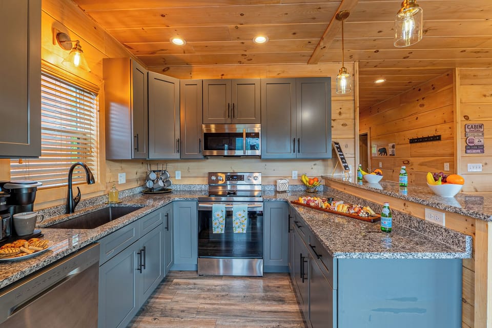Open, fully equipped kitchen with bar seating for 3 and everything you need.