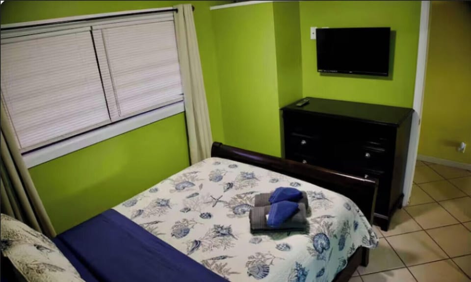 Queen size bed with smart TV