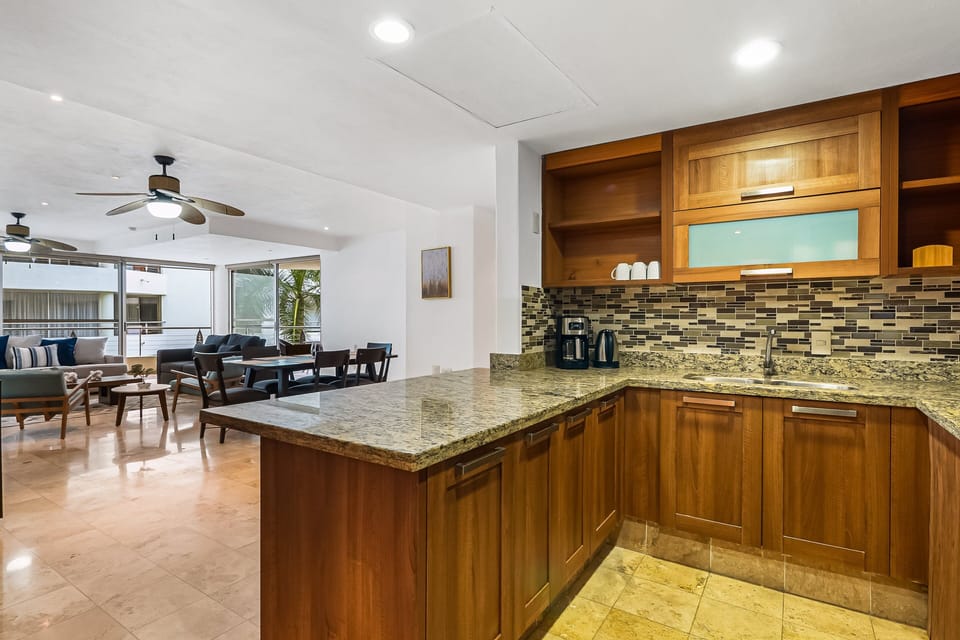 Experience seamless indoor living with an open-concept kitchen connected to the dining and living areas, perfect for entertaining and family gatherings.