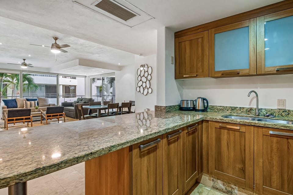 Open kitchen layout overlooking living and dining areas for easy entertaining.