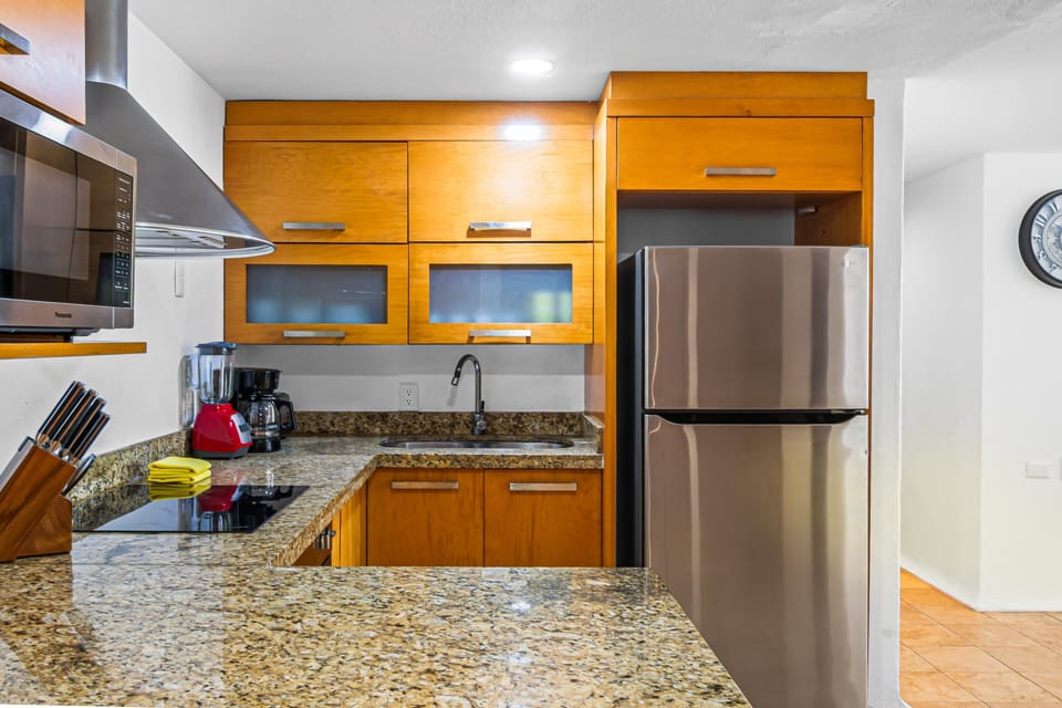 Modern kitchen with ample counter space and storage designed for convenience and easy meal preparation.
