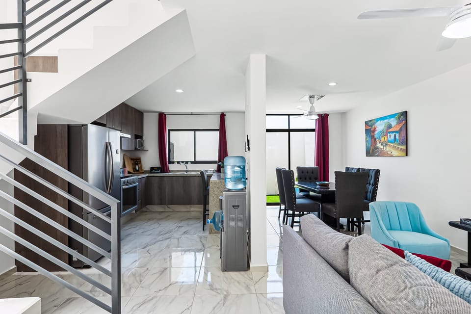 Enjoy an airy open layout connecting the living room, dining area, and kitchen for effortless gathering and entertaining.