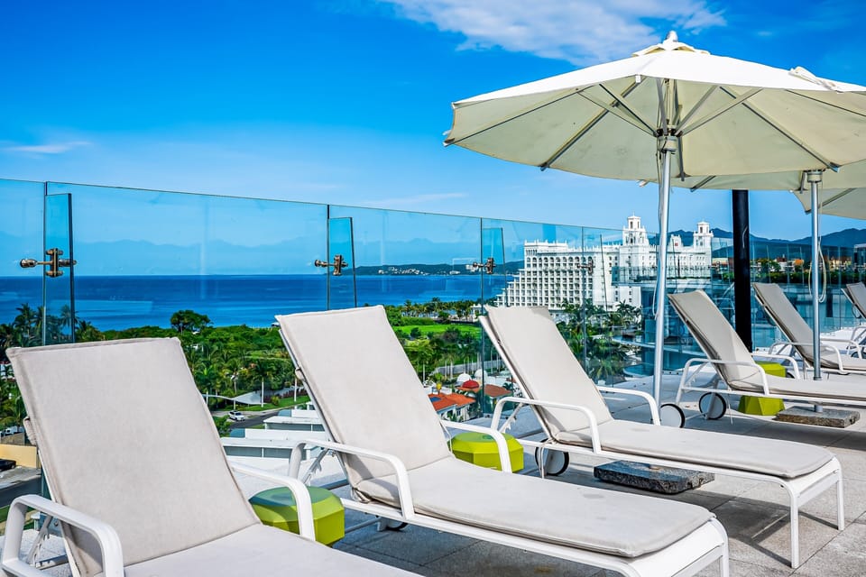 Relax on your exclusive rooftop terrace complete with lounge chairs, panoramic ocean views, and plenty of space to soak up the sun.
