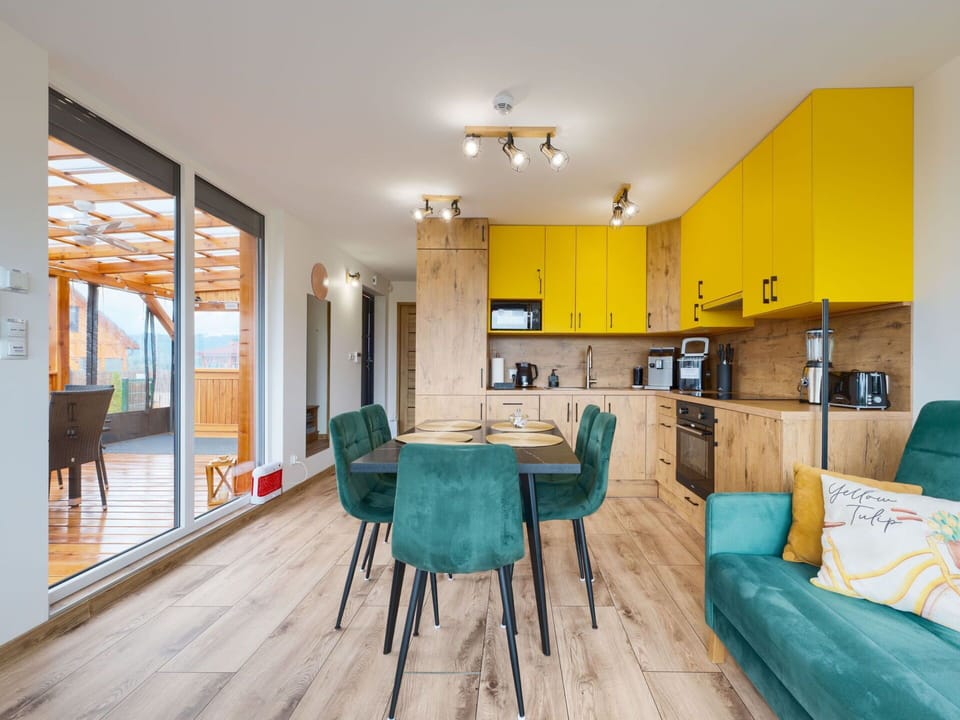 Furniture, Interior Design, Flooring, Wood, Floor, Room, Ceiling, Wood Flooring, Lighting, Apartment
