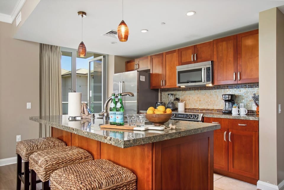 This bright, open kitchen invites you to slow down, sip something good, and savor every moment around the island HKH-406