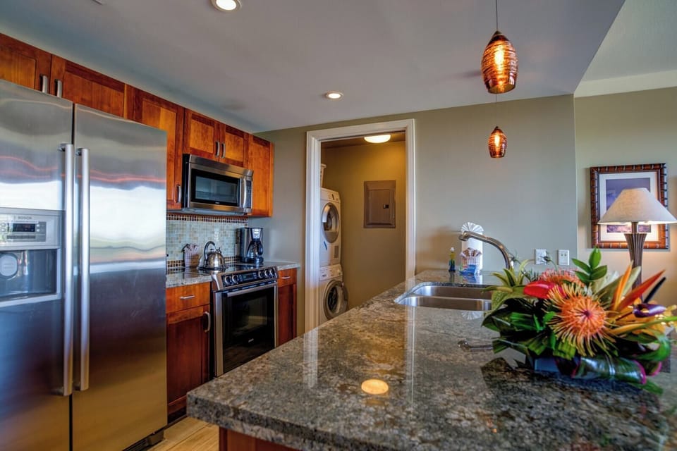 Custom kitchen - complete with washer and dryer in unit ready for your use    HKH-338