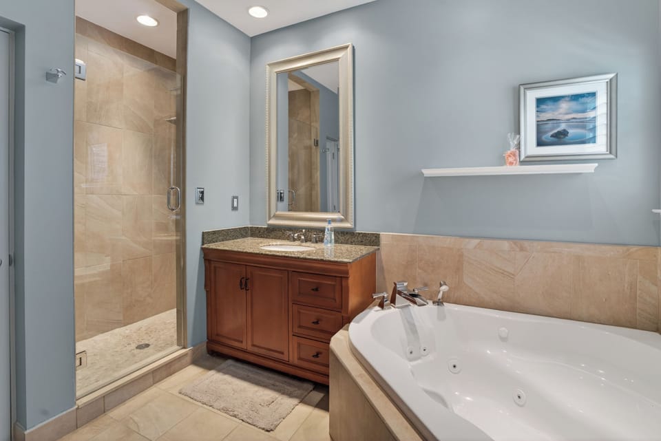Ensuite - Jetted Tub and Custom Tile Work in the Spacious Shower