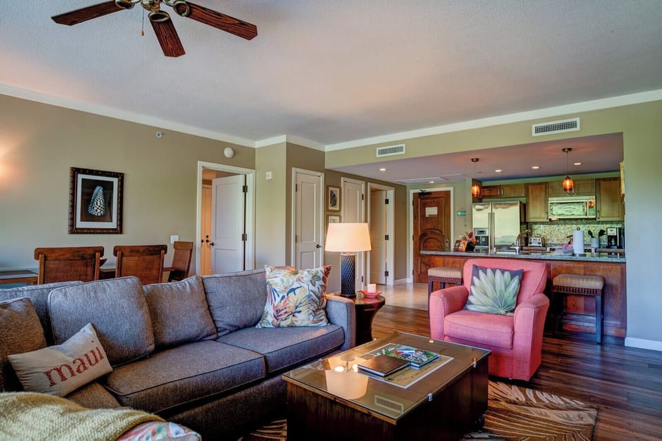 Spacious open-concept living with island charm and modern kitchen comfort. HKK-242