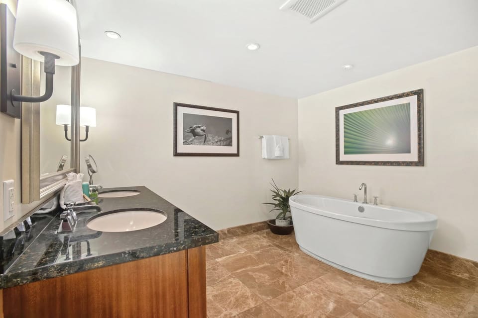 Your spa-style bathroom with soaking tub and double vanity for post island wind-downs  HKK-449