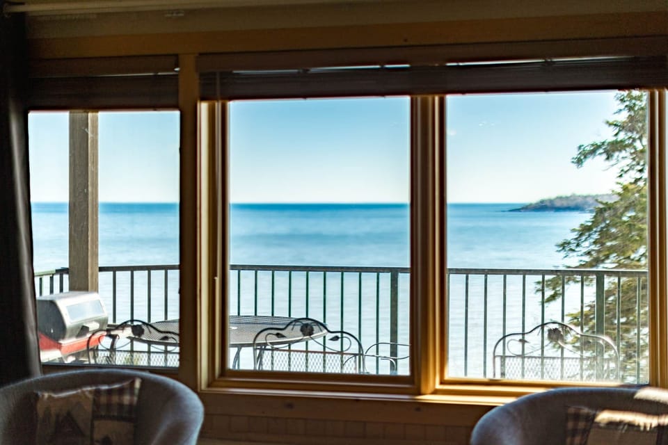 Panoramic Lake views from every seat in the living room.
