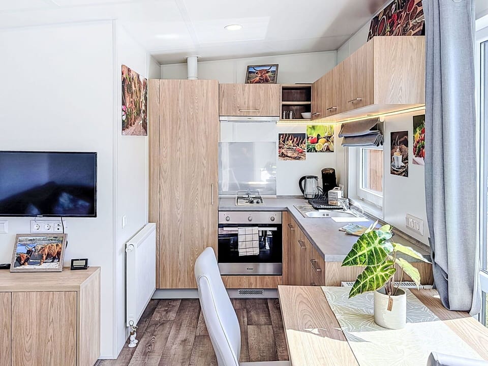 Furniture, Home, Floor, Wood Stain, Kitchen & Dining Room Table, Living Room, Chair, Countertop