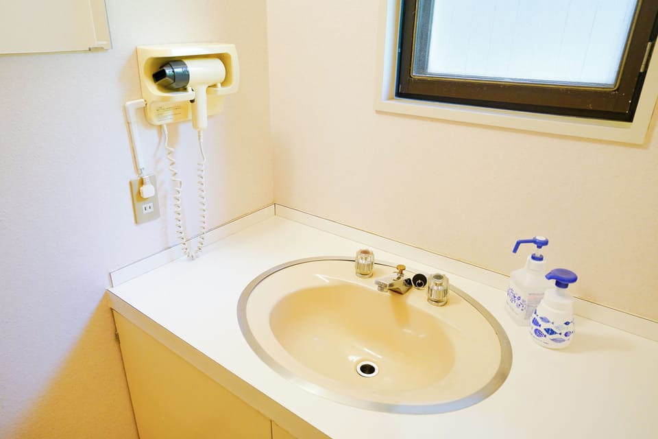 Standard Quadruple Room, Mountain View | Bathroom | Hair dryer, toilet paper