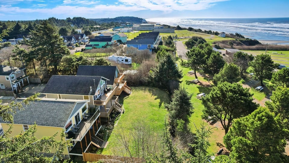 Expansive multi-level decks overlooking serene, private nature views.
