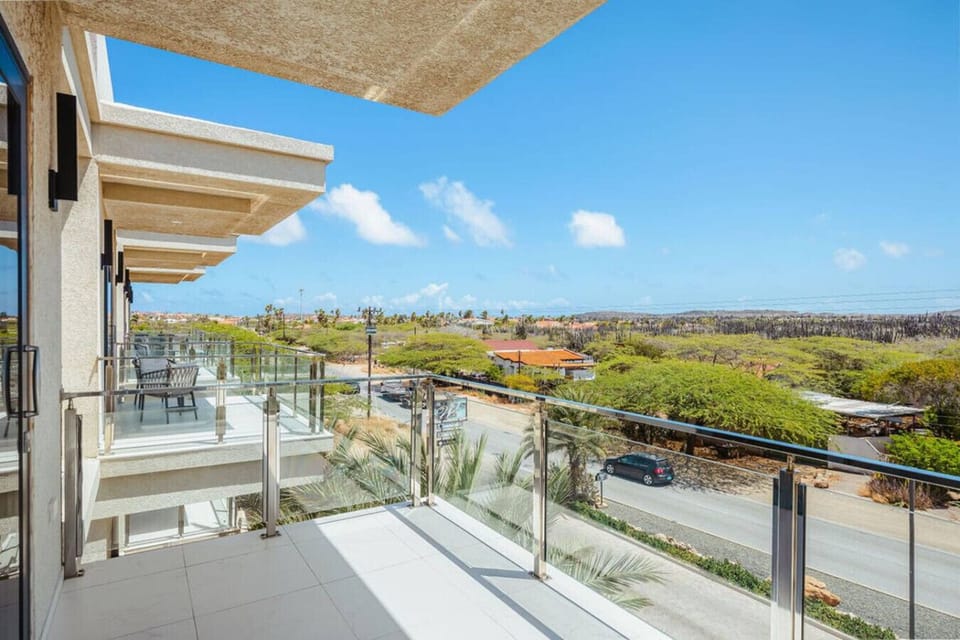Private balcony with open views—perfect for morning coffee or sunset unwinding.