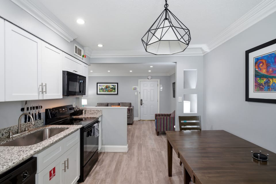 Unit 201 kitchen — cook, dine & settle in w/ everything you need.
