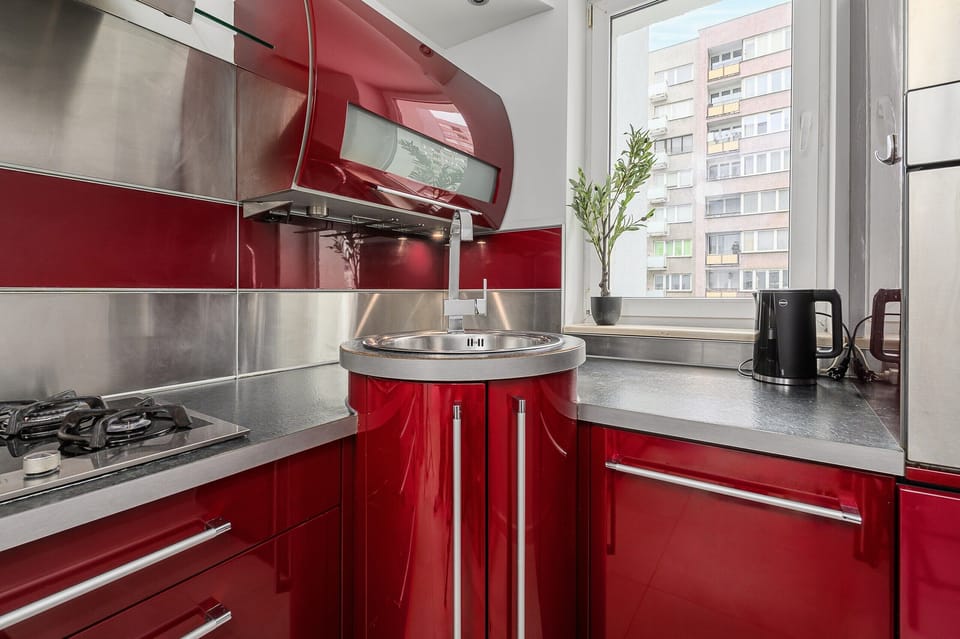 Comfort Apartment, Balcony, City View | Private kitchen | Griddle, spices, cleaning supplies, freezer