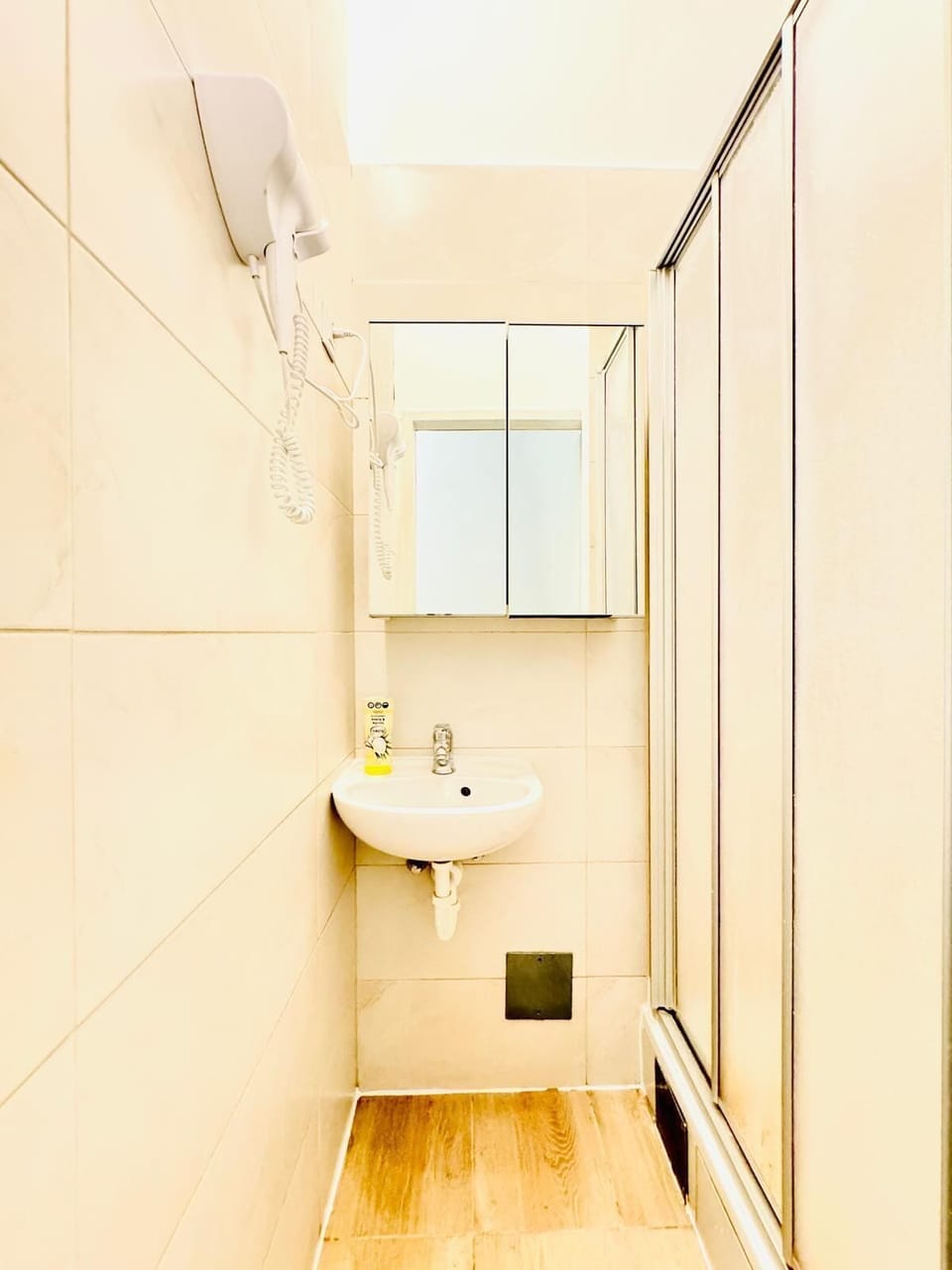 Basic Apartment | Bathroom | Free toiletries, hair dryer, towels, soap