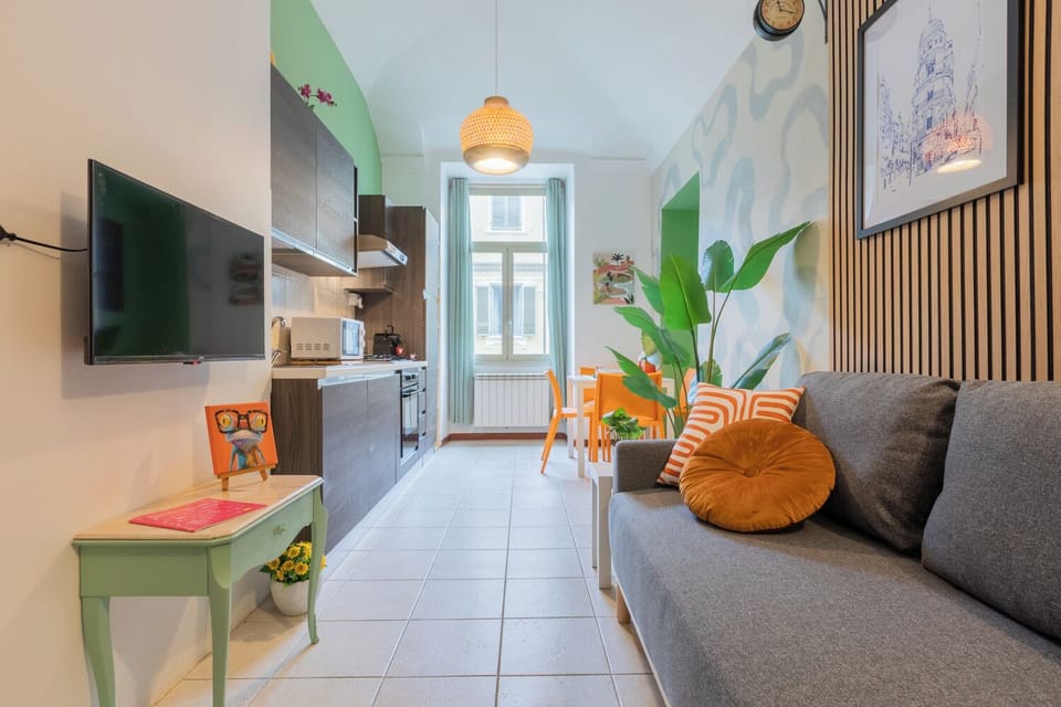 Basic Apartment, Balcony | Living area | 30-cm TV with digital channels