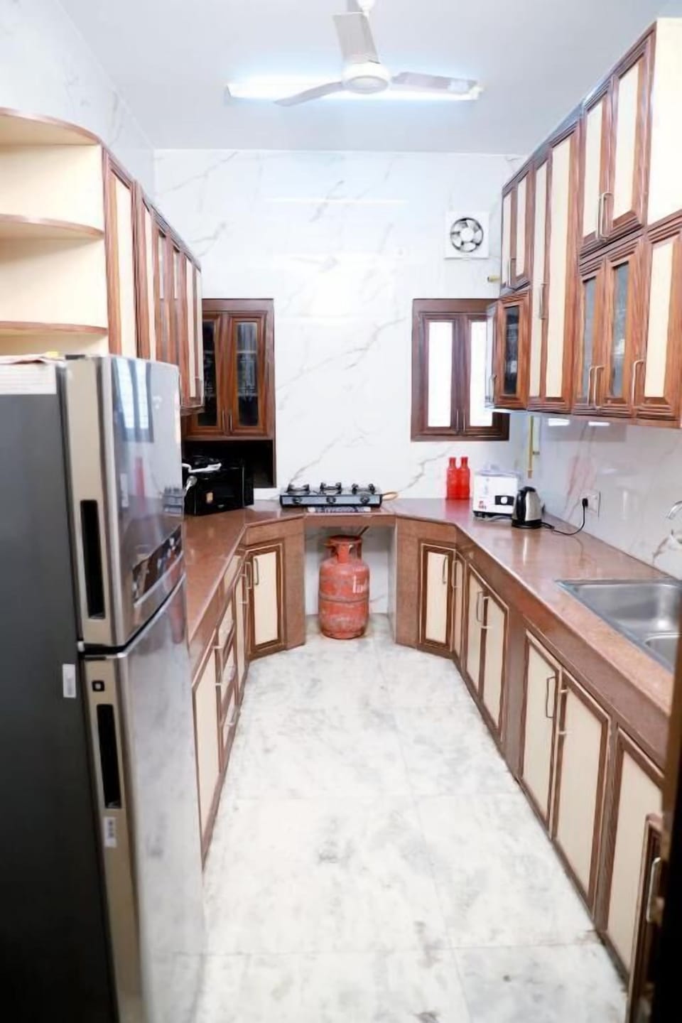 Apartment, Balcony, City View | Private kitchen | Dining tables