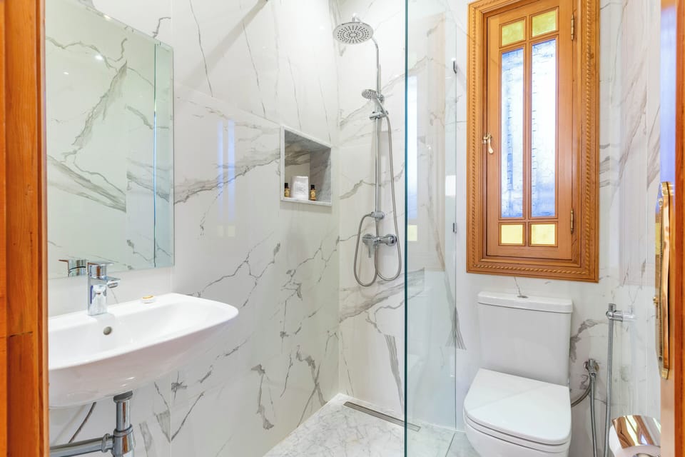 Double Room | Bathroom | Shower, hair dryer, towels, soap