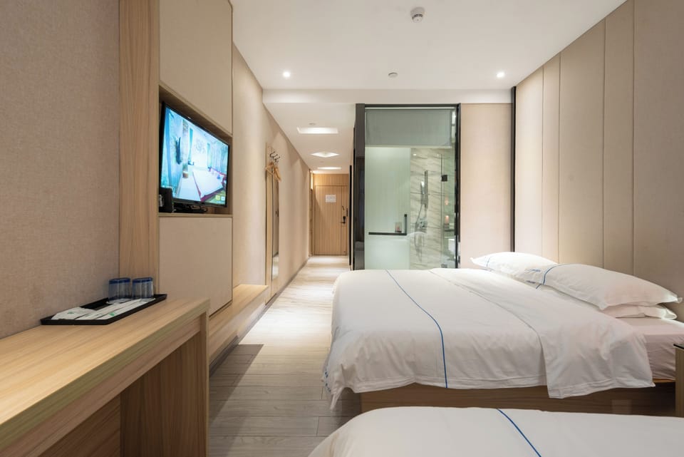 Family Twin Room, City View | Desk, blackout drapes, soundproofing, free WiFi