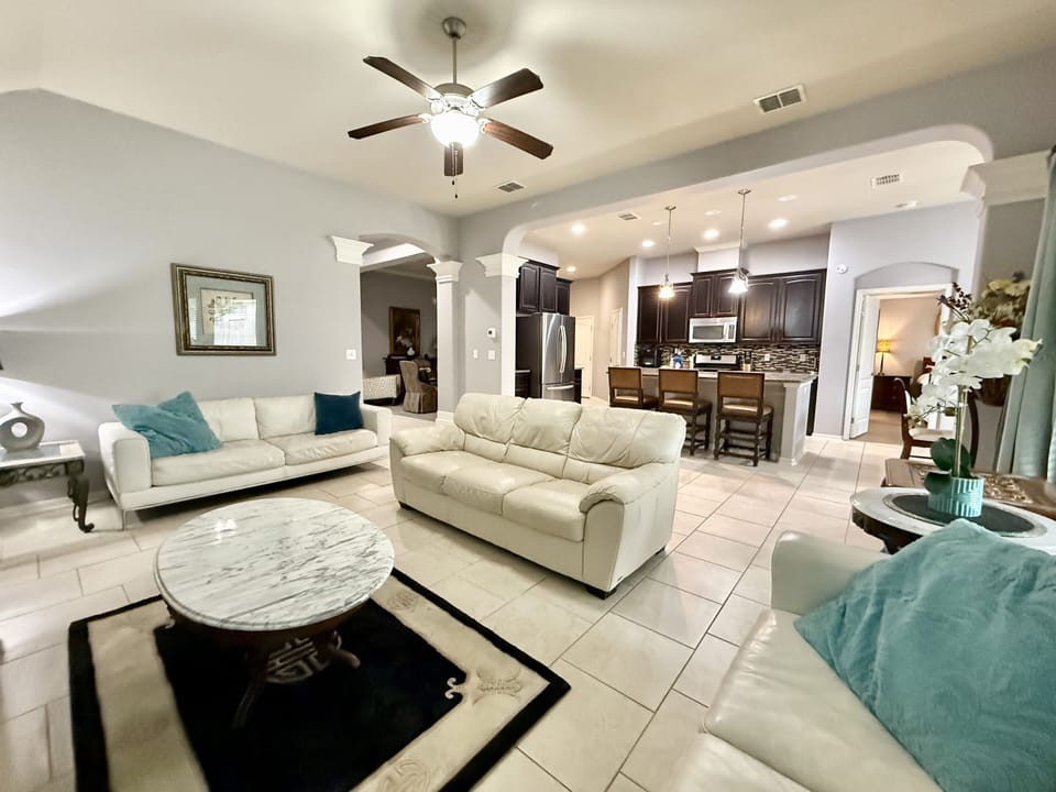Spacious living room with comfortable seating—perfect for relaxing