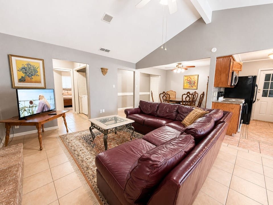 Spacious living room with comfortable seating and open layout.