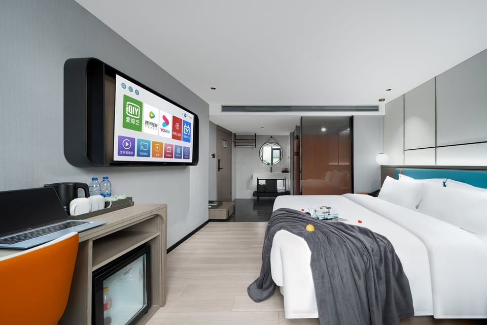 Luxury Double Room, City View | Desk, laptop workspace, blackout drapes, soundproofing