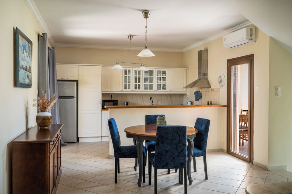 Villa, Garden View | Private kitchen | Espresso maker, electric kettle, dining table
