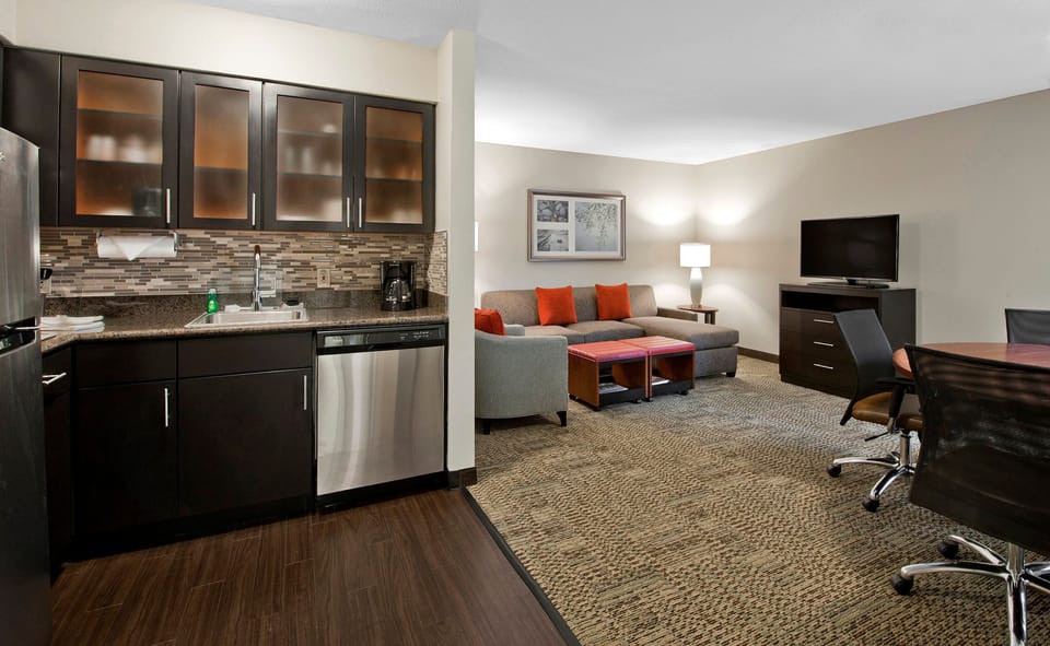 Open-plan studio with kitchen and spacious living area.
