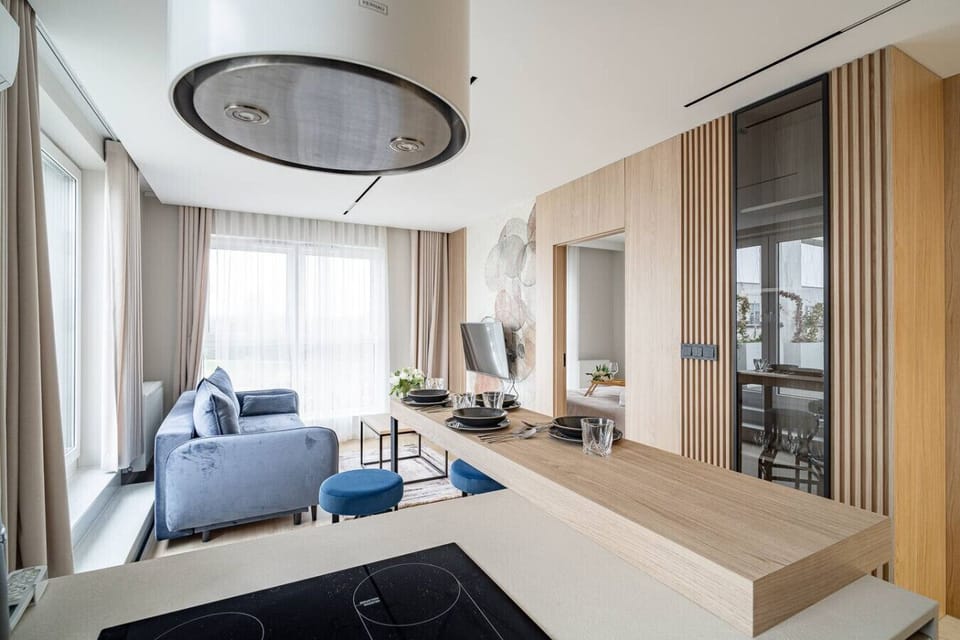 Bright Living Area with Sofa, Smart TV and Access to Private Terrace | Book Now with RENTUJEMY.COM