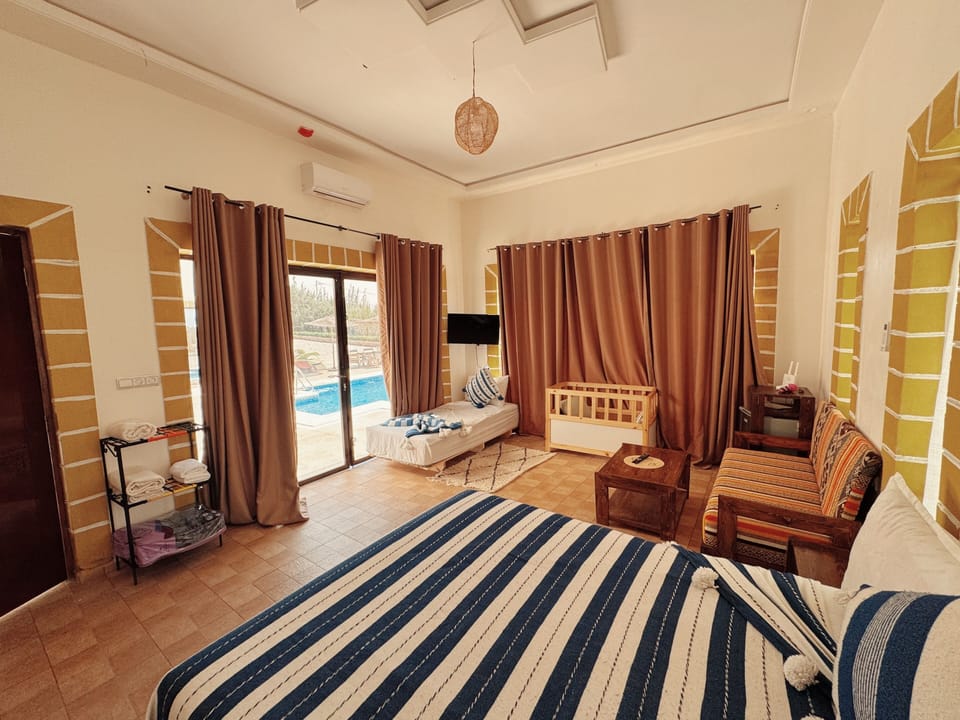 Family Room, Pool View | Iron/ironing board, free WiFi