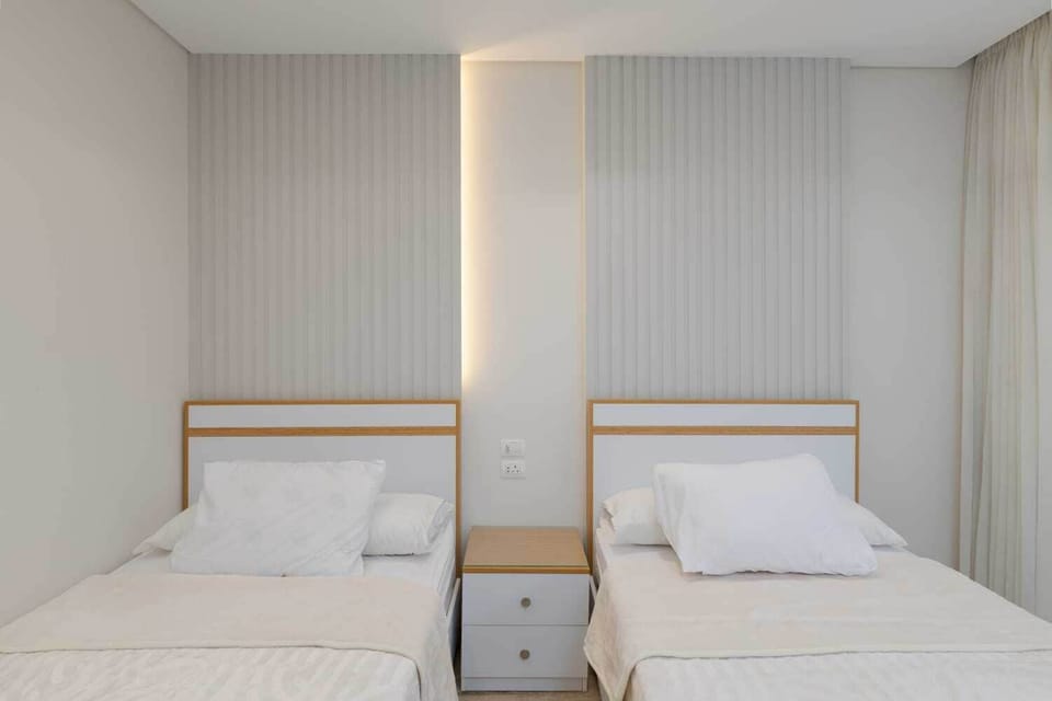 Comfort Apartment, 2 Bedrooms, Garden View | Minibar, laptop workspace, iron/ironing board, free WiFi