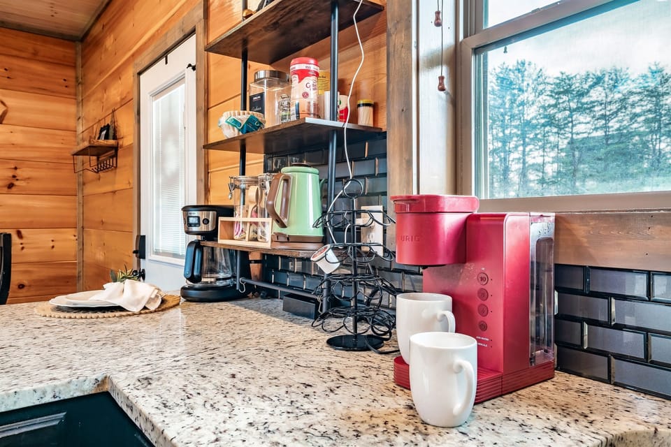 Start your day right with a fully stocked coffee station offering both Keurig and drip options.
