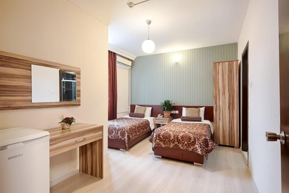 Double Room, City View | In-room safe, blackout drapes, soundproofing, iron/ironing board