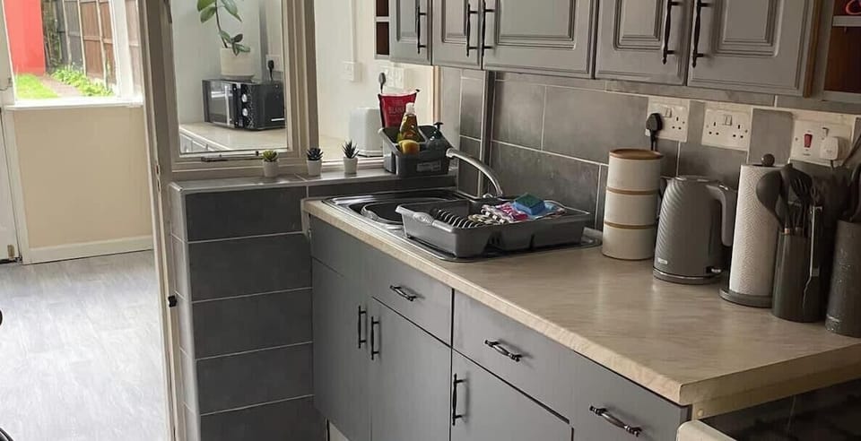 Kitchen at Escape & Estates Serviced Accommodation & Short Lets 			