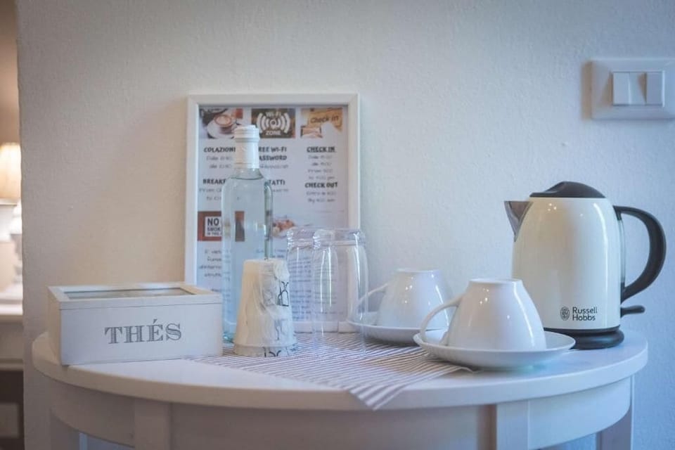 Deluxe Double Room, Garden View | Coffee and/or coffee maker