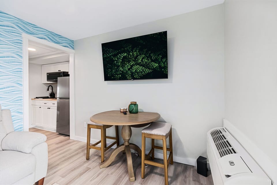 Dining table with seating for two just off the kitchenette
